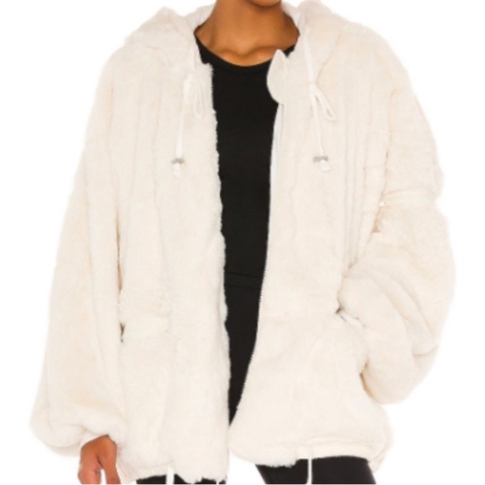 Free People Movement Take a Moment Faux Fur Hooded Jacket in ivory.